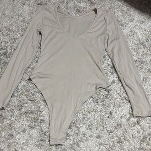 Women’s Beige Long Sleeve Bodysuit medium‎ NWOT.
